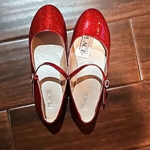 A girl children shoes children size 5 red sparkling